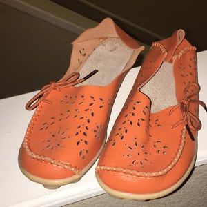 Super cute orange leather flats